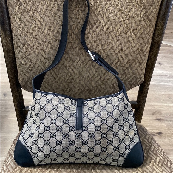 Brown and Black Shoulder Bag with Iconic Design - Picture 3 of 12